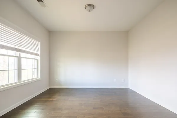 an empty room with a window