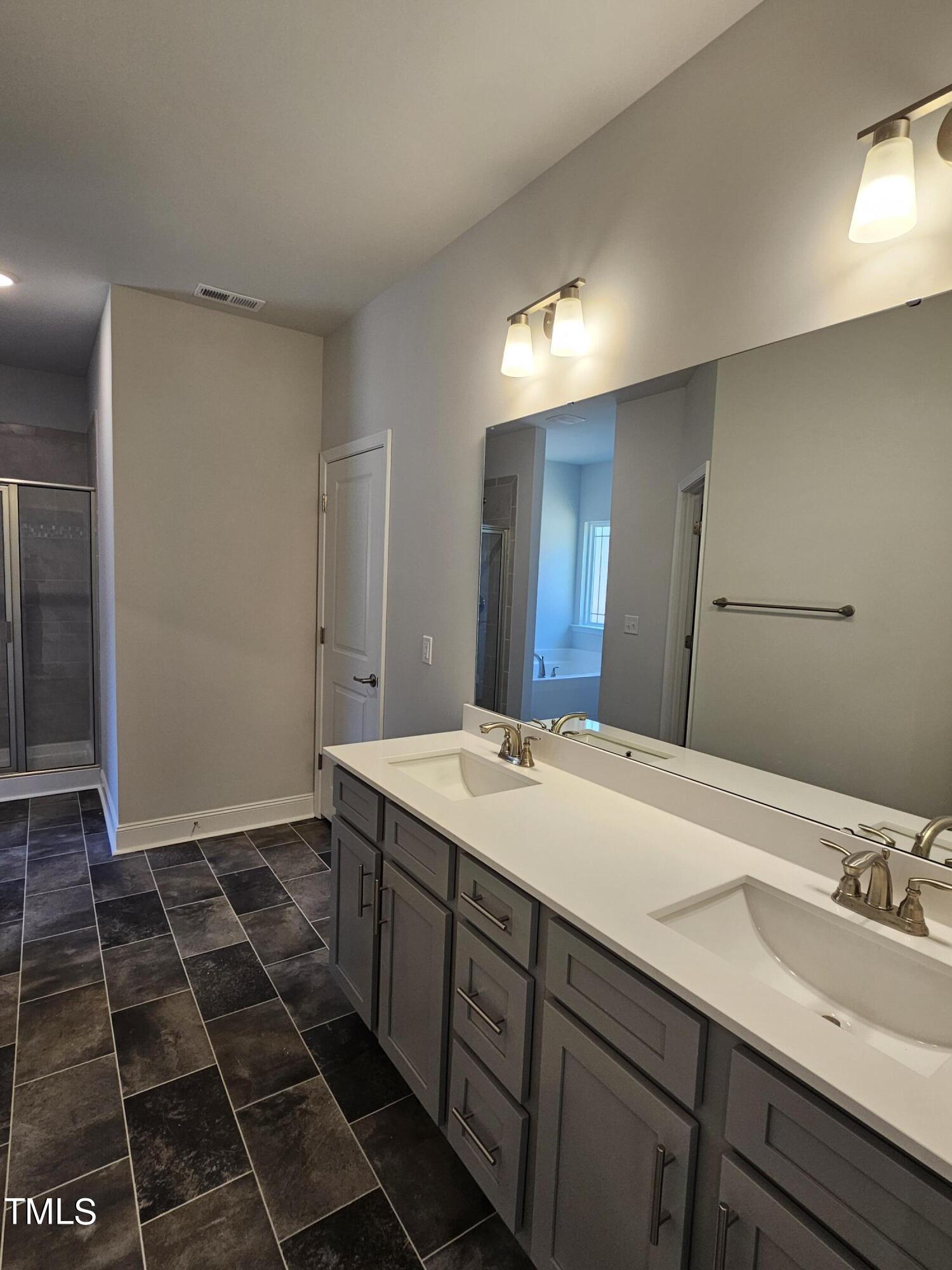 28 Decatur Drive Fuquay-Varina, NC 27526 - Photo 12 of 26 Primary bathroom
