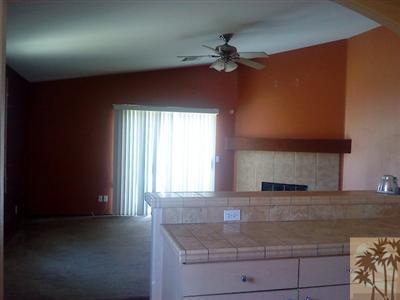 66696 San Rafael Road Desert Hot Springs, CA 92240 - Photo 8 of 21 a kitchen with sink and window
