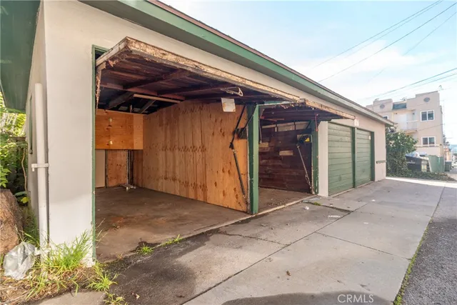 an aerial view of a house with swimming pool