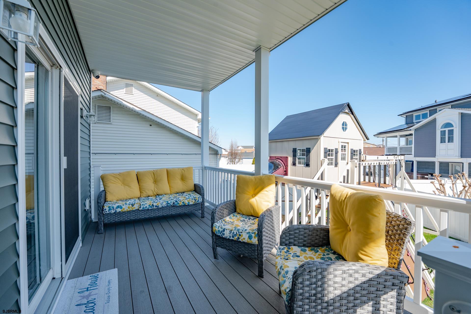 703 Bobby Jones Road Brigantine, NJ 08203 - Photo 22 of 34 a view of living room with furniture and wooden floor