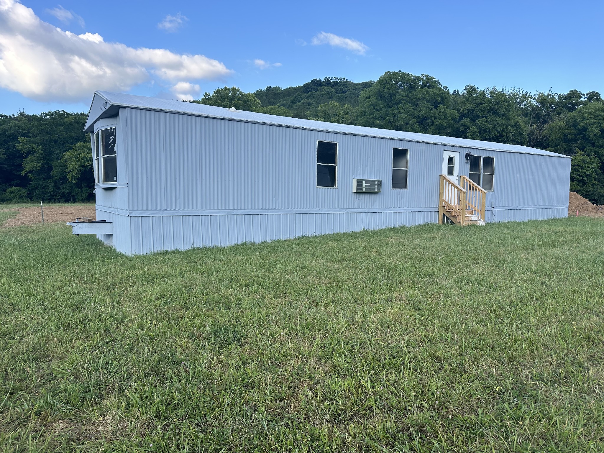 12 Young Road Buffalo Valley, TN 38548 - Photo 1 of 12 a view of a back yard of the house