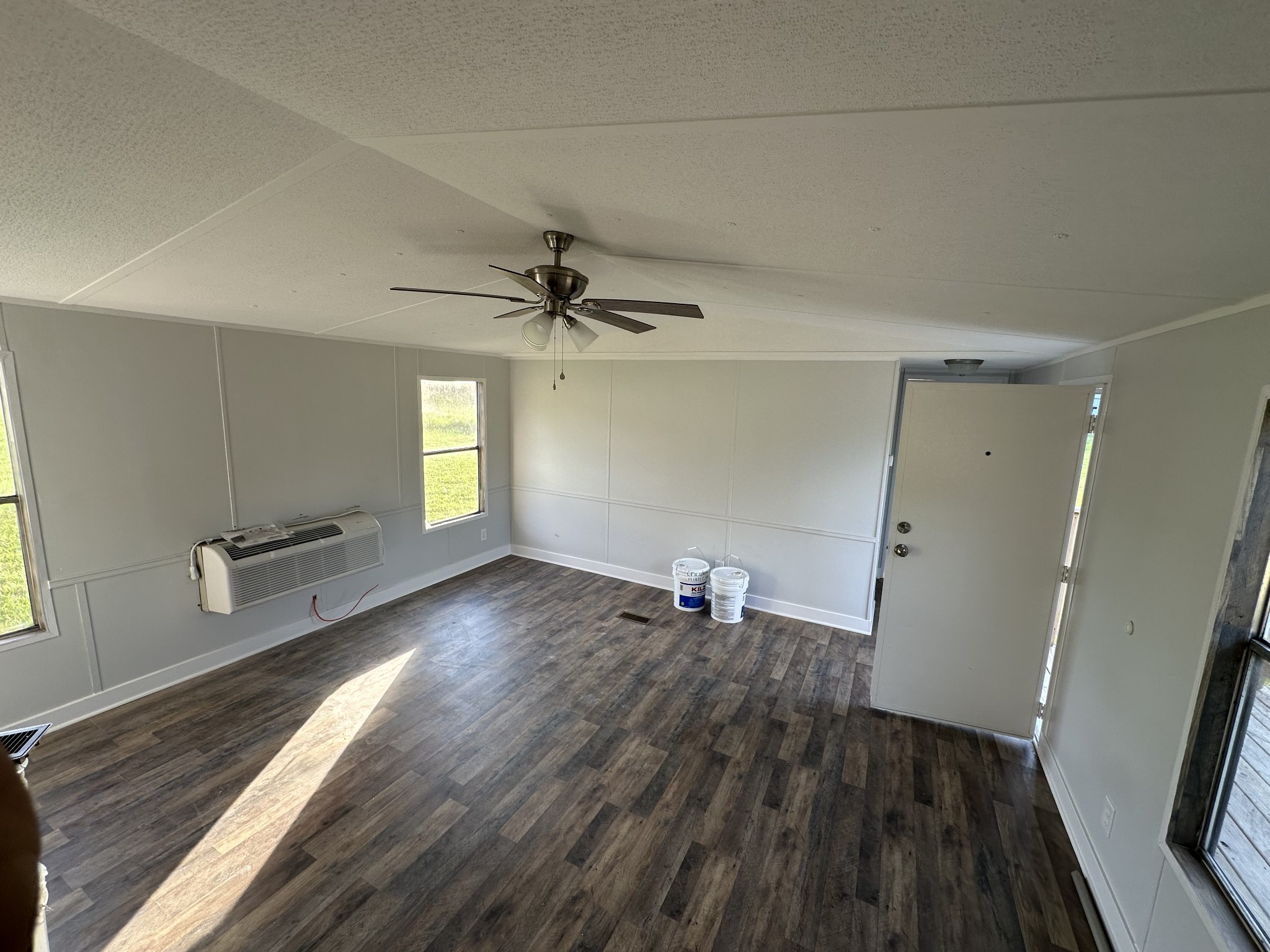 12 Young Road Buffalo Valley, TN 38548 - Photo 5 of 12 a view of empty room with wooden floor and fan