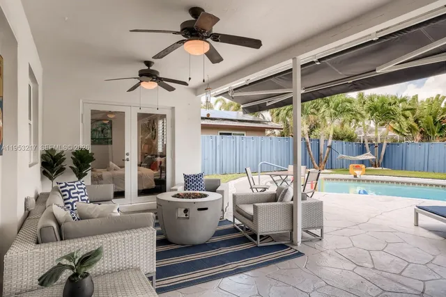 a swimming pool with wooden fence