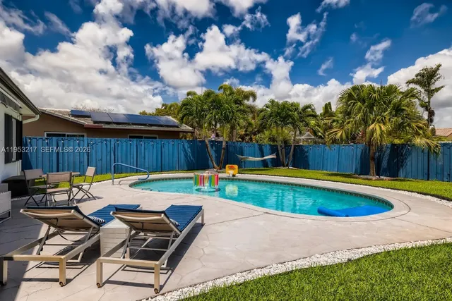 a view of a backyard with a garden