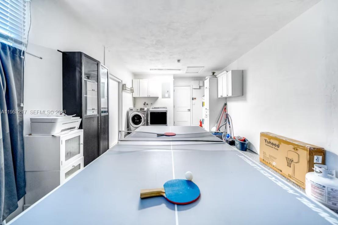 5117 Cleveland Street Hollywood, FL 33021 - Photo 37 of 39 a kitchen with stainless steel appliances a refrigerator and a stove