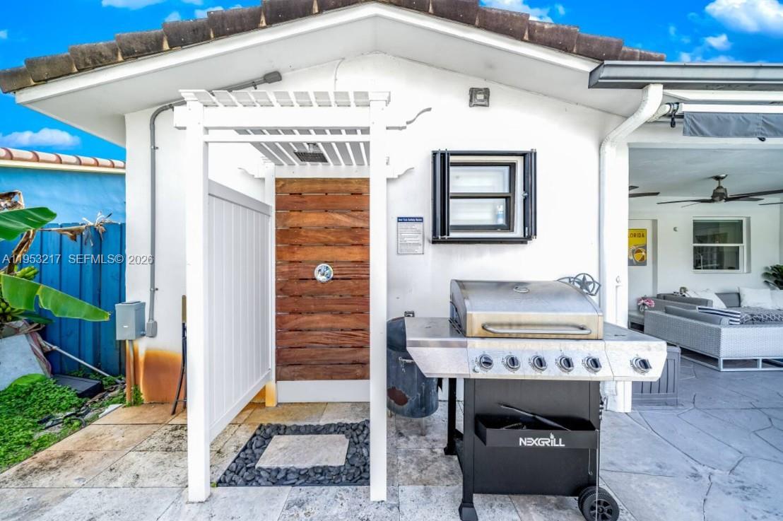 5117 Cleveland Street Hollywood, FL 33021 - Photo 38 of 39 a view of a entryway door of the house