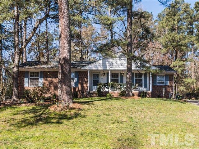 1726 Euclid Road Durham, NC 27713 - Photo 1 of 25 a front view of a building with a garden