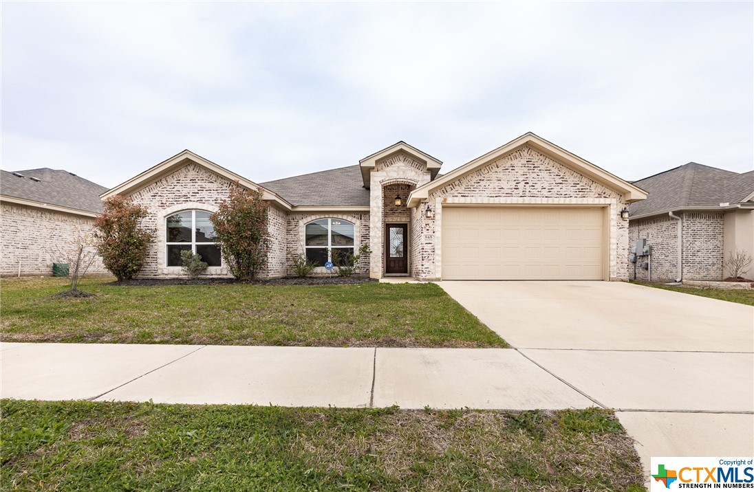 545 Bella Rose Drive Belton, TX 76513 - Photo 1 of 1 a front view of a house with a yard