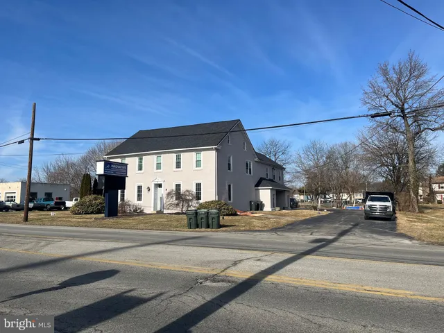 a view of a building with a street