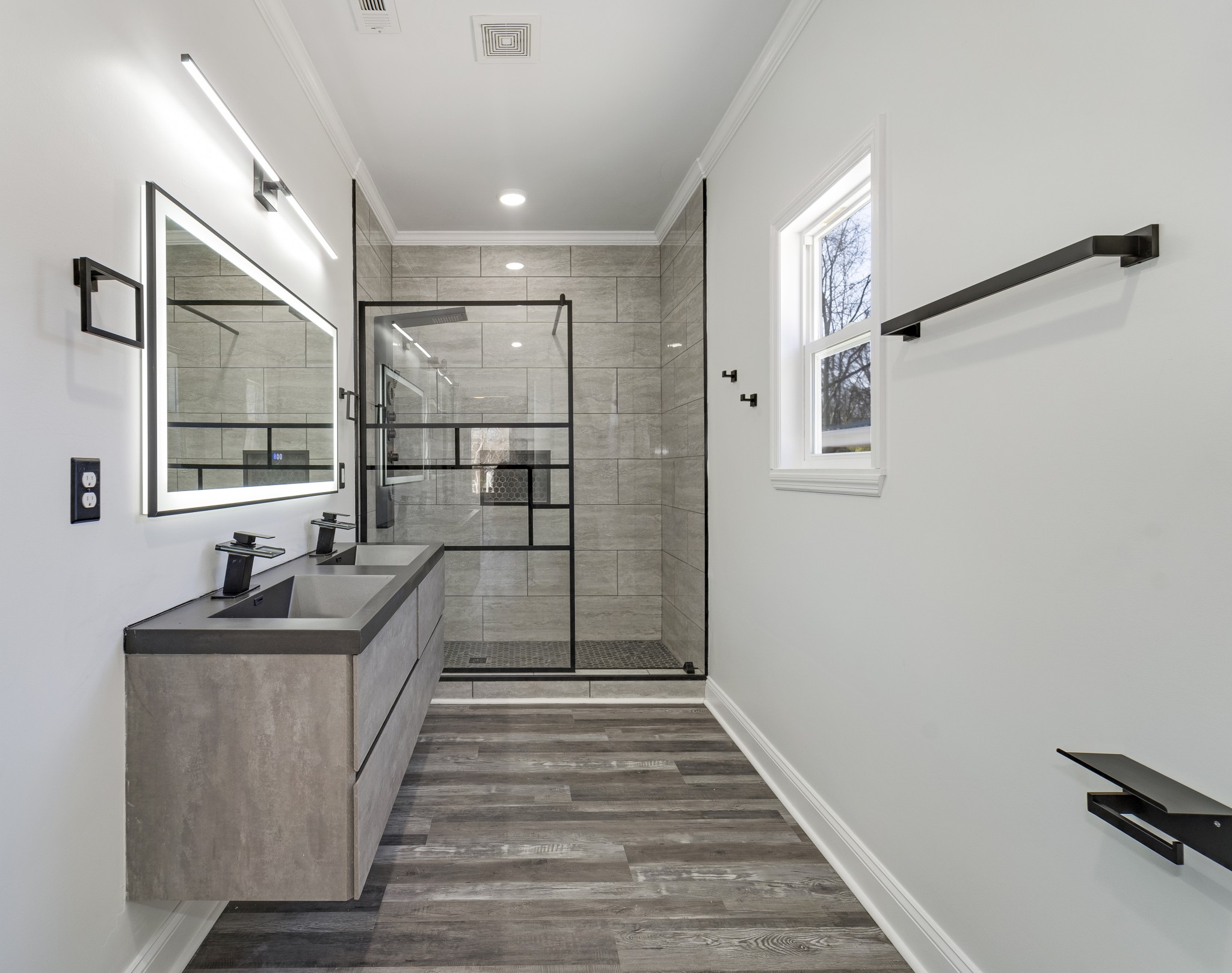 307 Wall Street Mount Pleasant, TN 38474 - Photo 19 of 33 a bathroom with sink and a window
