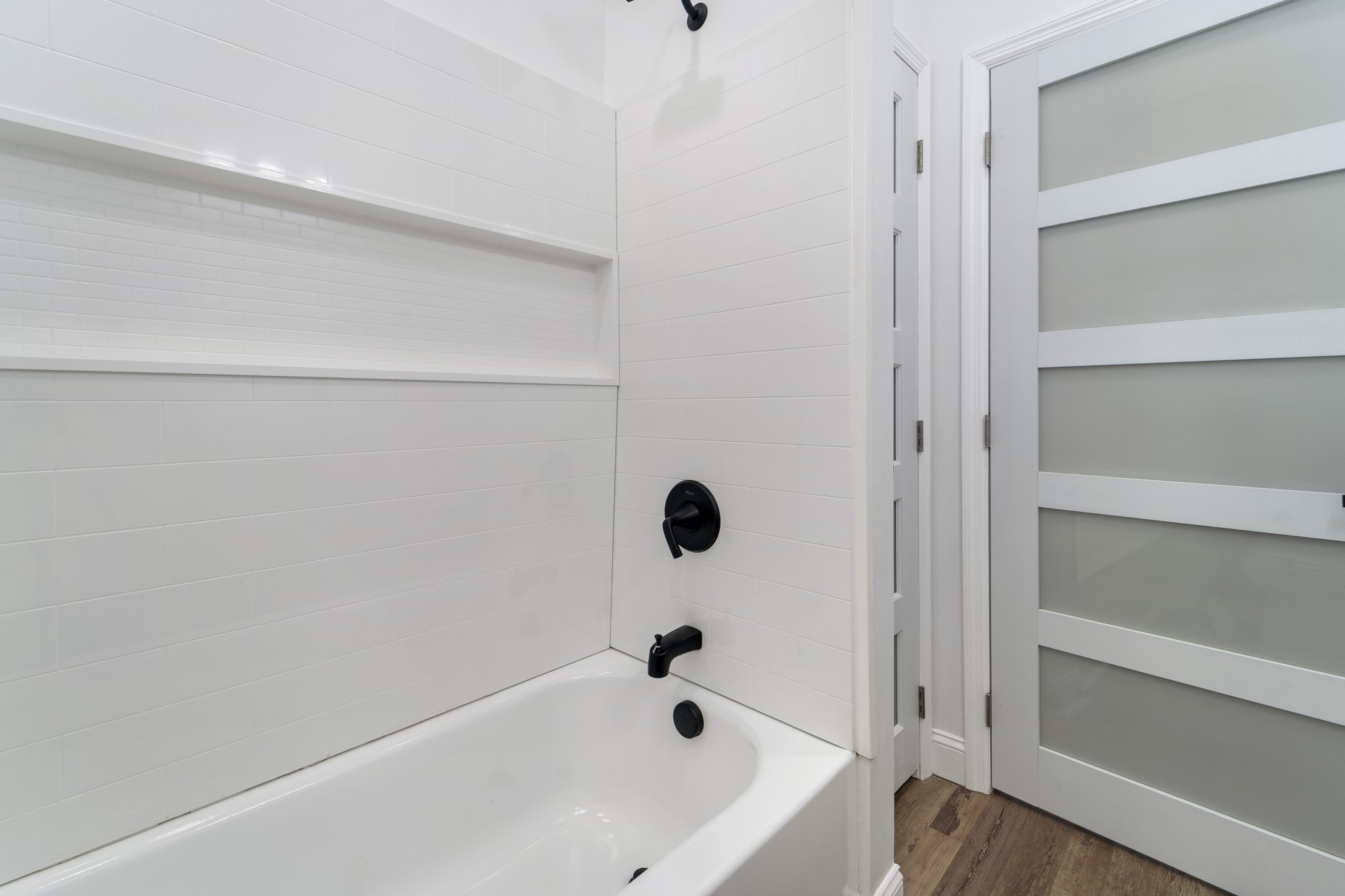 307 Wall Street Mount Pleasant, TN 38474 - Photo 27 of 33 a bathroom with a tub