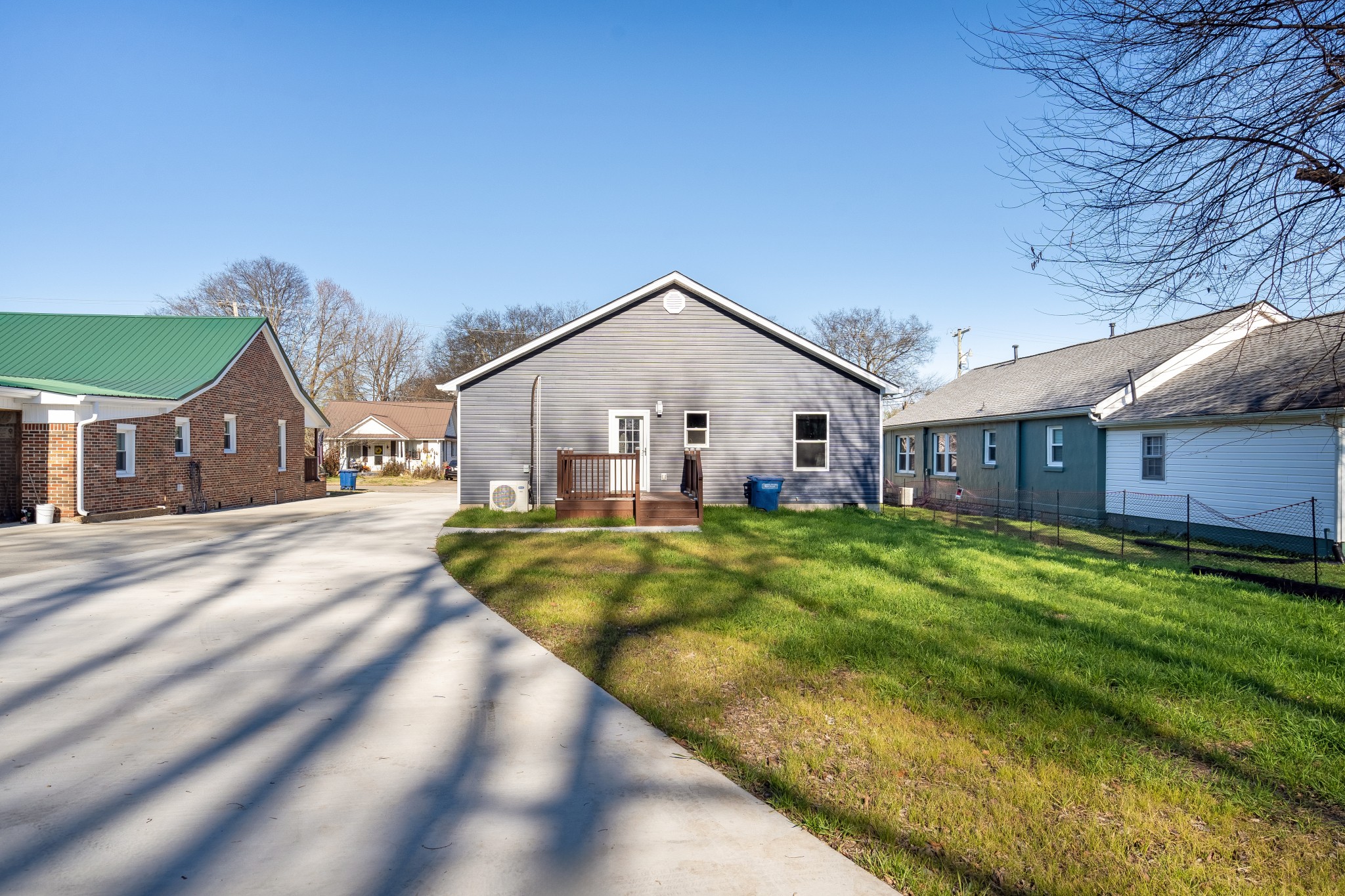 307 Wall Street Mount Pleasant, TN 38474 - Photo 32 of 33 a view of a house with a yard