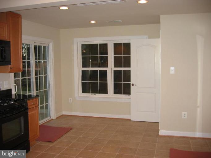 6635 Cornell Drive Alexandria, VA 22307 - Photo 3 of 10 a view of an empty room with a window
