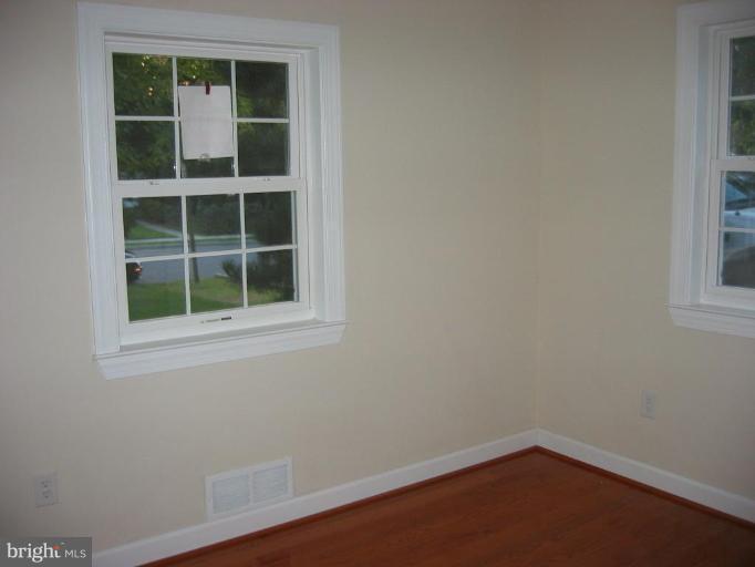 6635 Cornell Drive Alexandria, VA 22307 - Photo 9 of 10 a view of empty room with windows