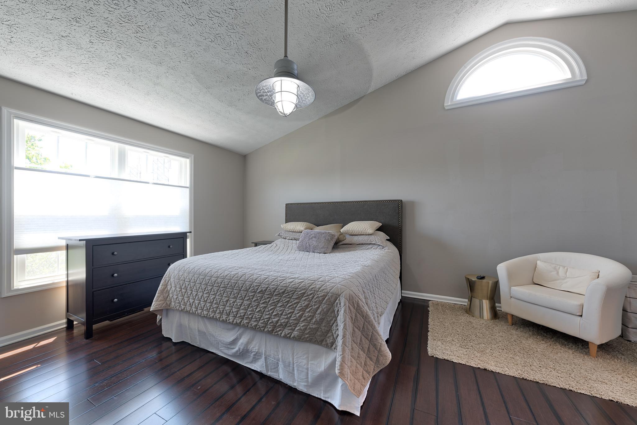 9231 Bretton Reef Road Baltimore, MD 21234 - Photo 16 of 30 Stunning Vaulted Ceiling Enhances Master Bedroom