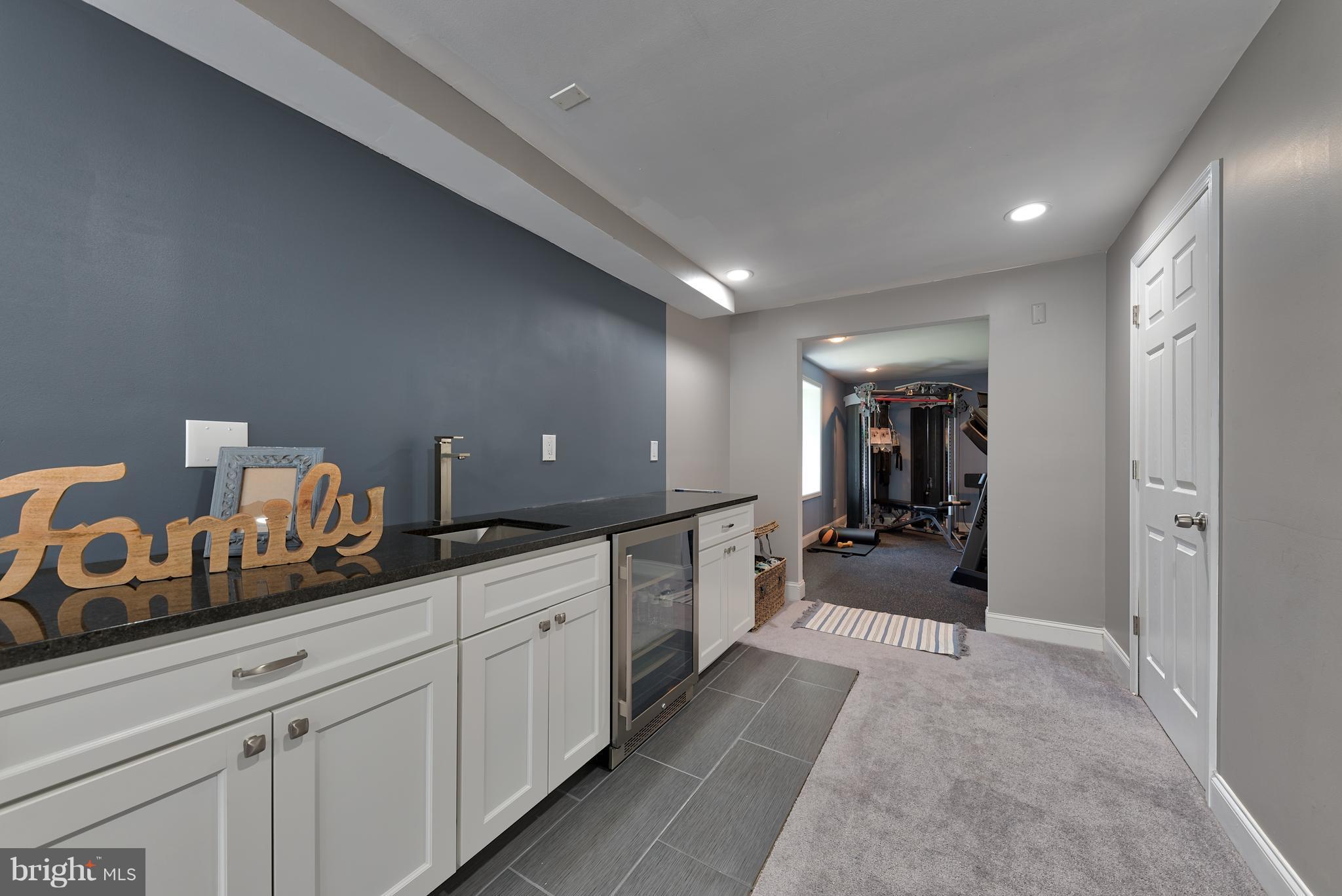 9231 Bretton Reef Road Baltimore, MD 21234 - Photo 22 of 30 Newly Installed Wet Bar in Basement