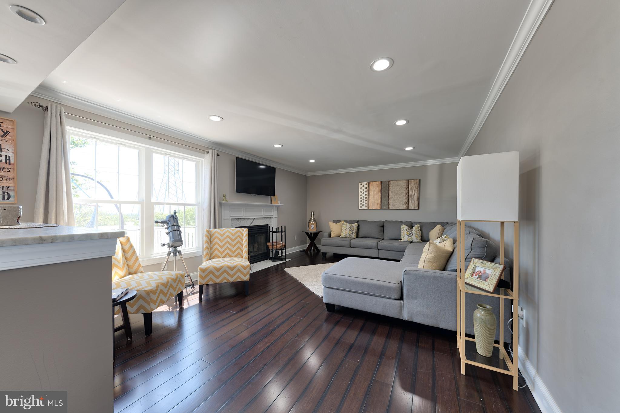 9231 Bretton Reef Road Baltimore, MD 21234 - Photo 10 of 30 Exquisite Family Room with Stunning Gas Fireplace