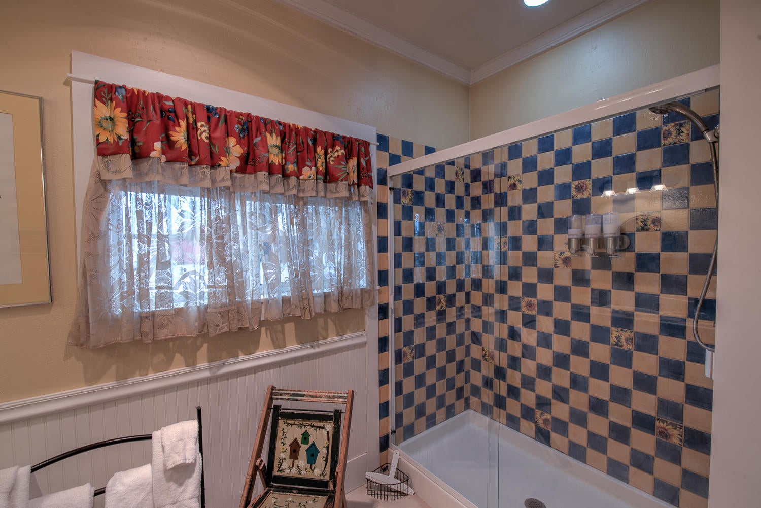 22222 Erickson Road Bend, OR 97701 - Photo 32 of 100 Mexican style tile work in shower, wainscoting add style to the master bath