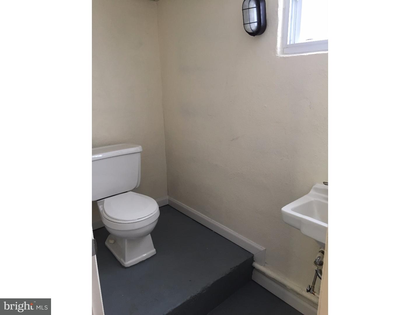 44 Lanci Road Maple Shade, NJ 08052 - Photo 21 of 25 a white toilet sitting next to a white sink