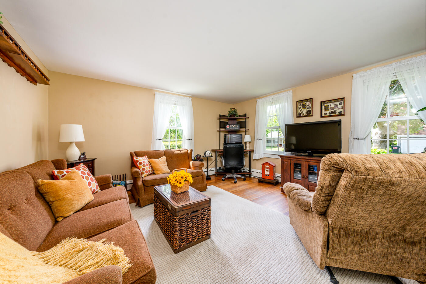 110 Bacon Road Hyannis, MA 02601 - Photo 13 of 37 a living room with furniture and a flat screen tv