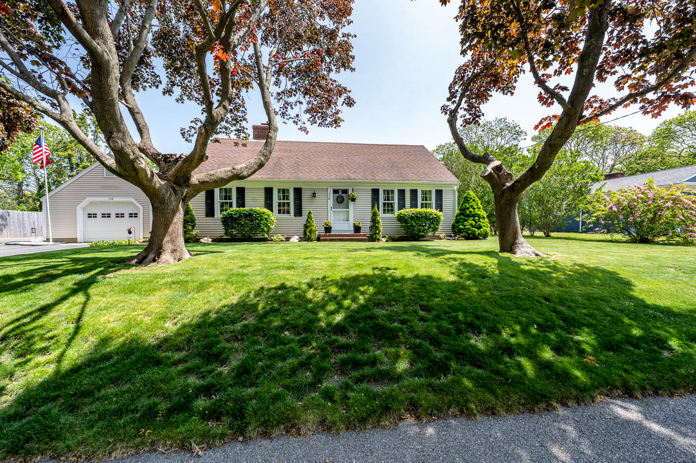 110 Bacon Road Hyannis, MA 02601 - Photo 2 of 37 a front view of a house with garden