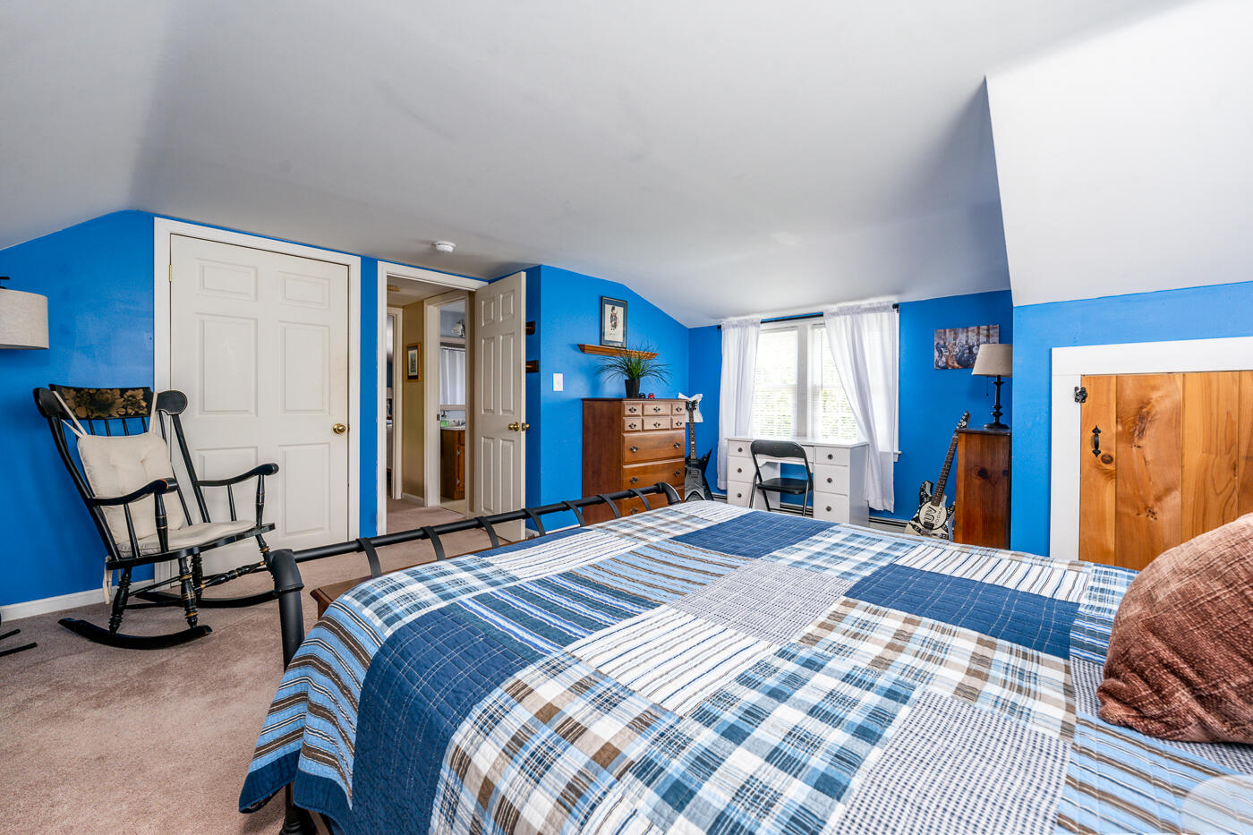 110 Bacon Road Hyannis, MA 02601 - Photo 21 of 37 a bedroom with a bed a chair and dresser