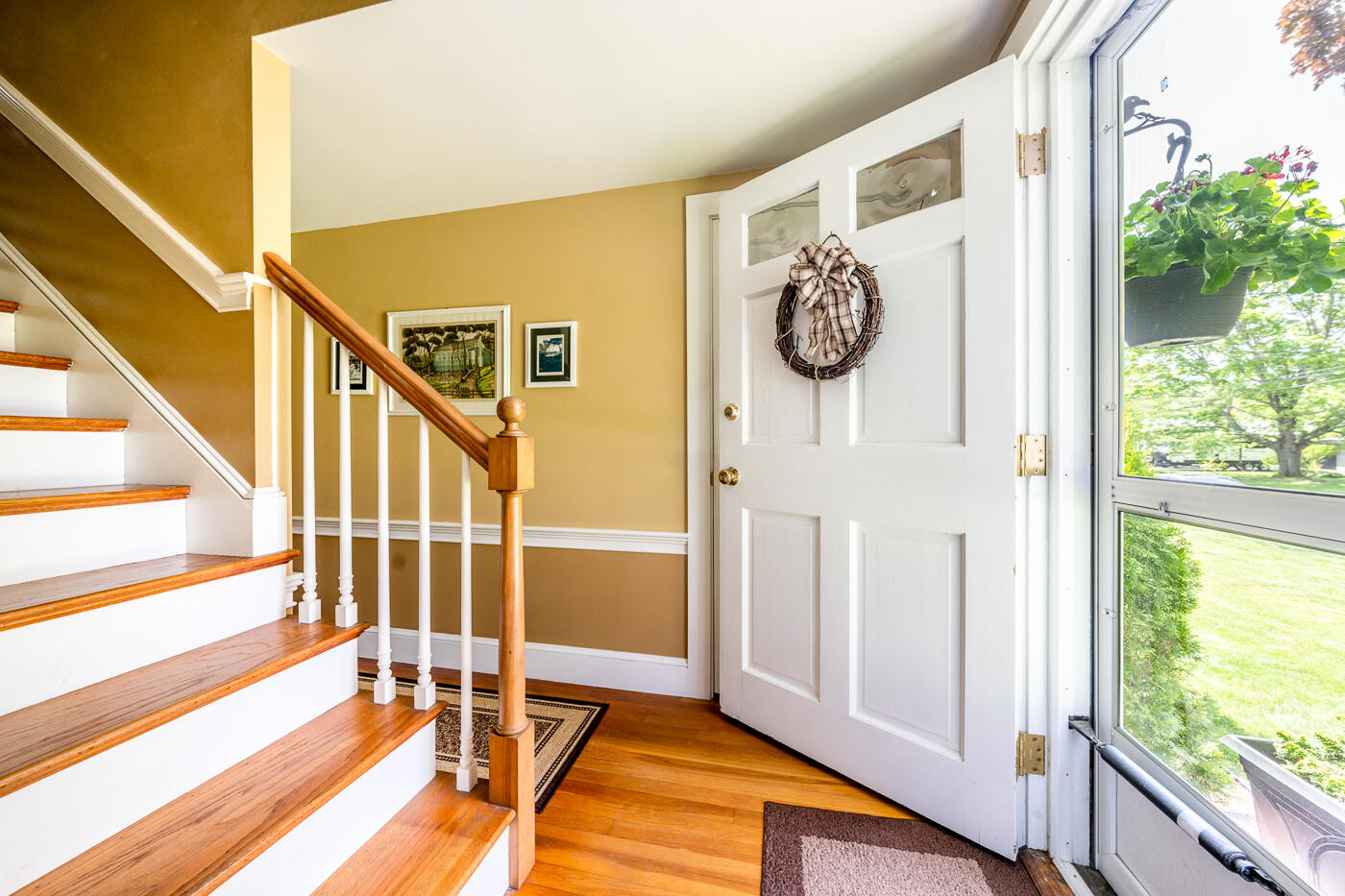 110 Bacon Road Hyannis, MA 02601 - Photo 3 of 37 a view of front door with wooden floor and windows