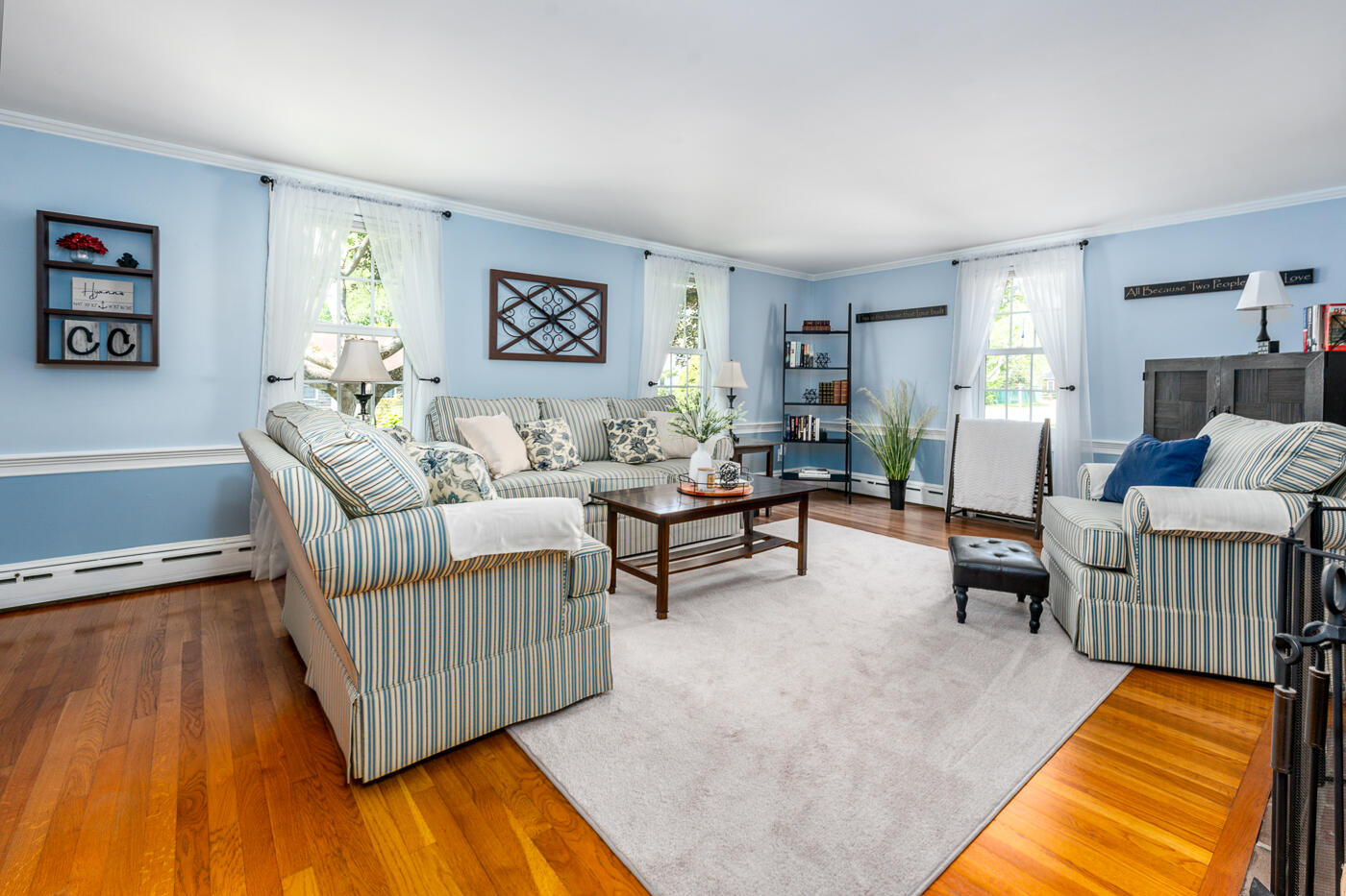 110 Bacon Road Hyannis, MA 02601 - Photo 4 of 37 a living room with furniture and a rug