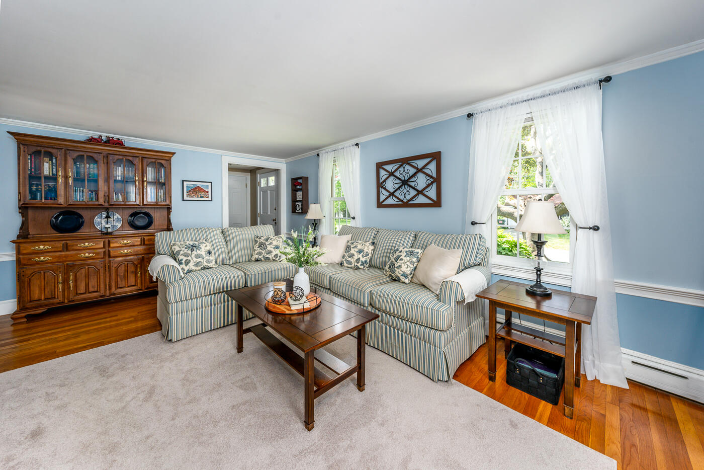 110 Bacon Road Hyannis, MA 02601 - Photo 5 of 37 a living room with furniture and a bookshelf