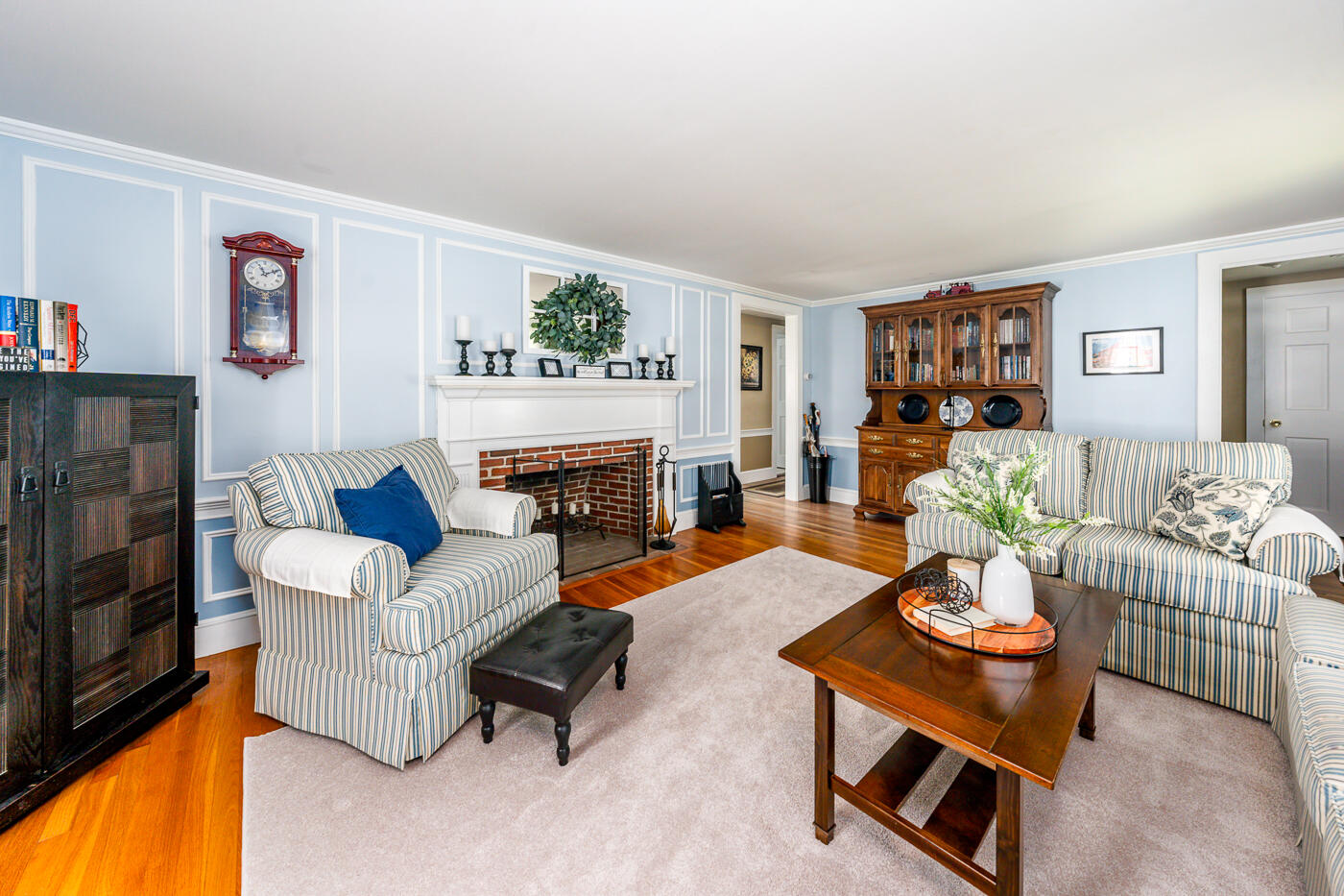 110 Bacon Road Hyannis, MA 02601 - Photo 6 of 37 a living room with furniture and a fireplace