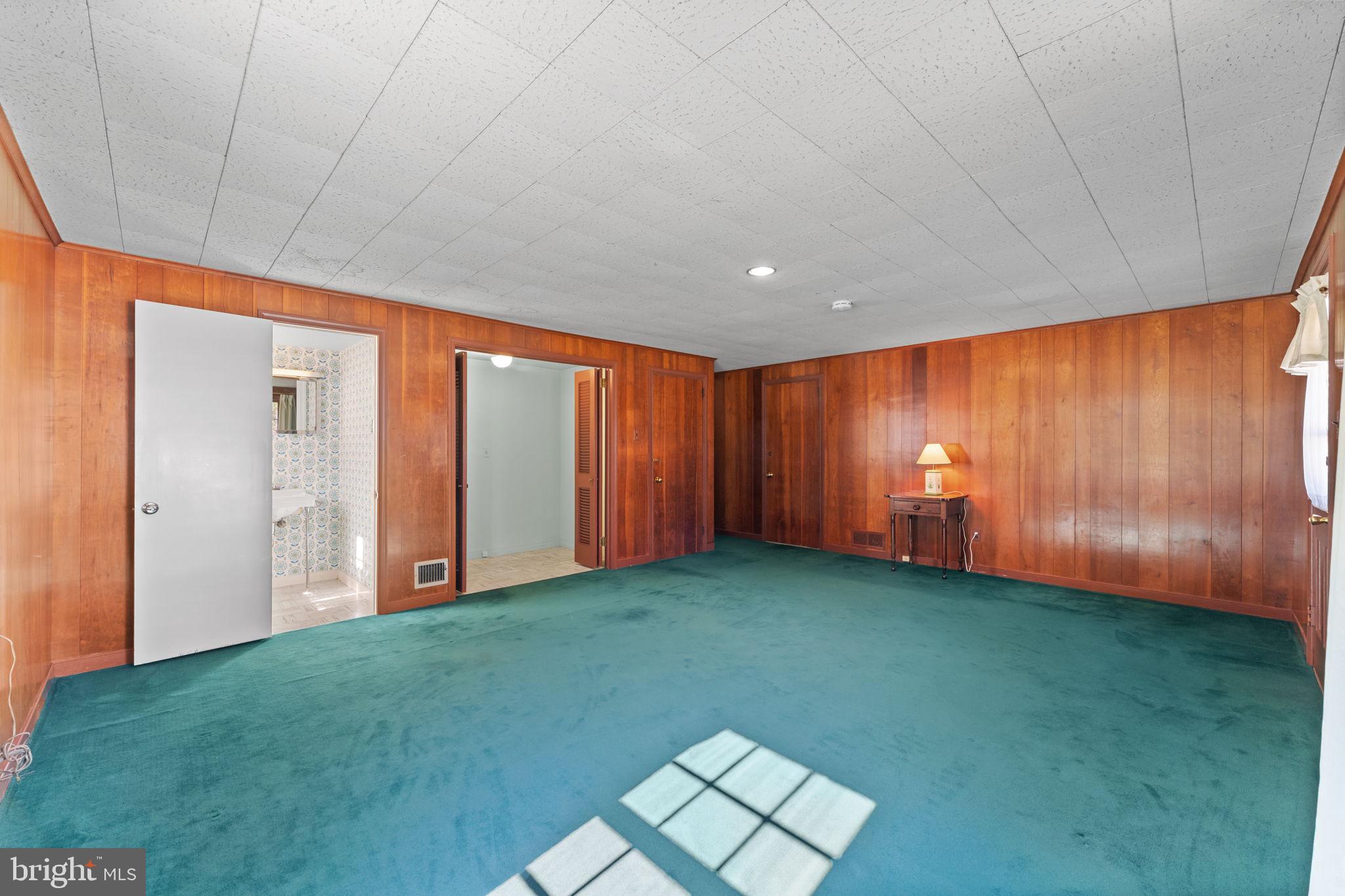 962 Weadley Road Radnor, PA 19087 - Photo 14 of 45 a view of an empty room with window and stairs