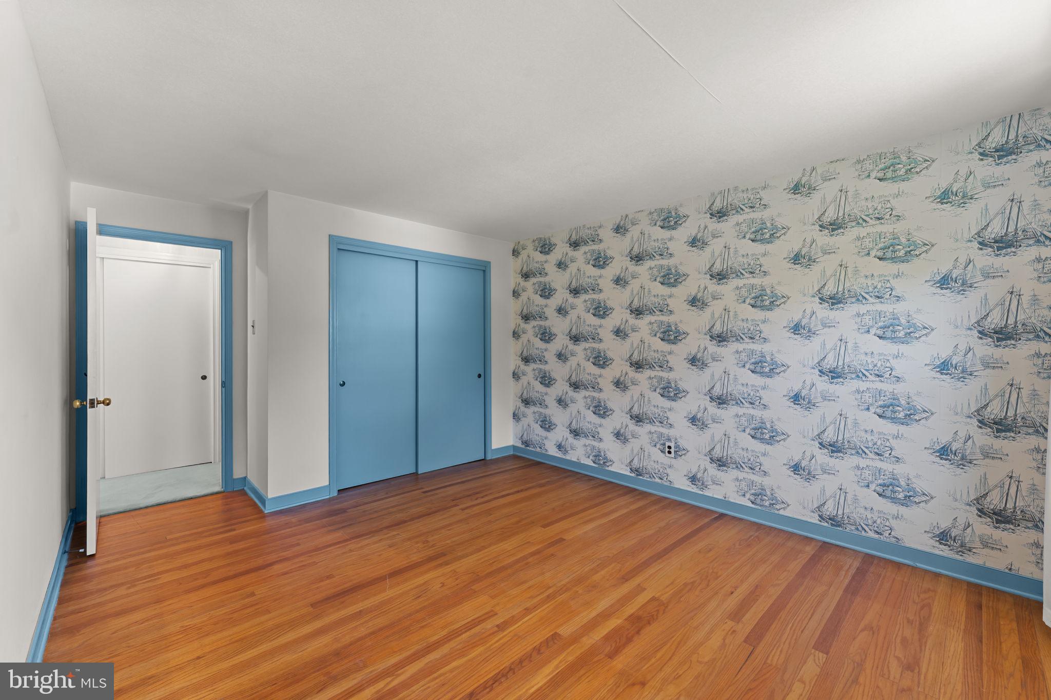 962 Weadley Road Radnor, PA 19087 - Photo 20 of 45 a view of empty room with wooden floor