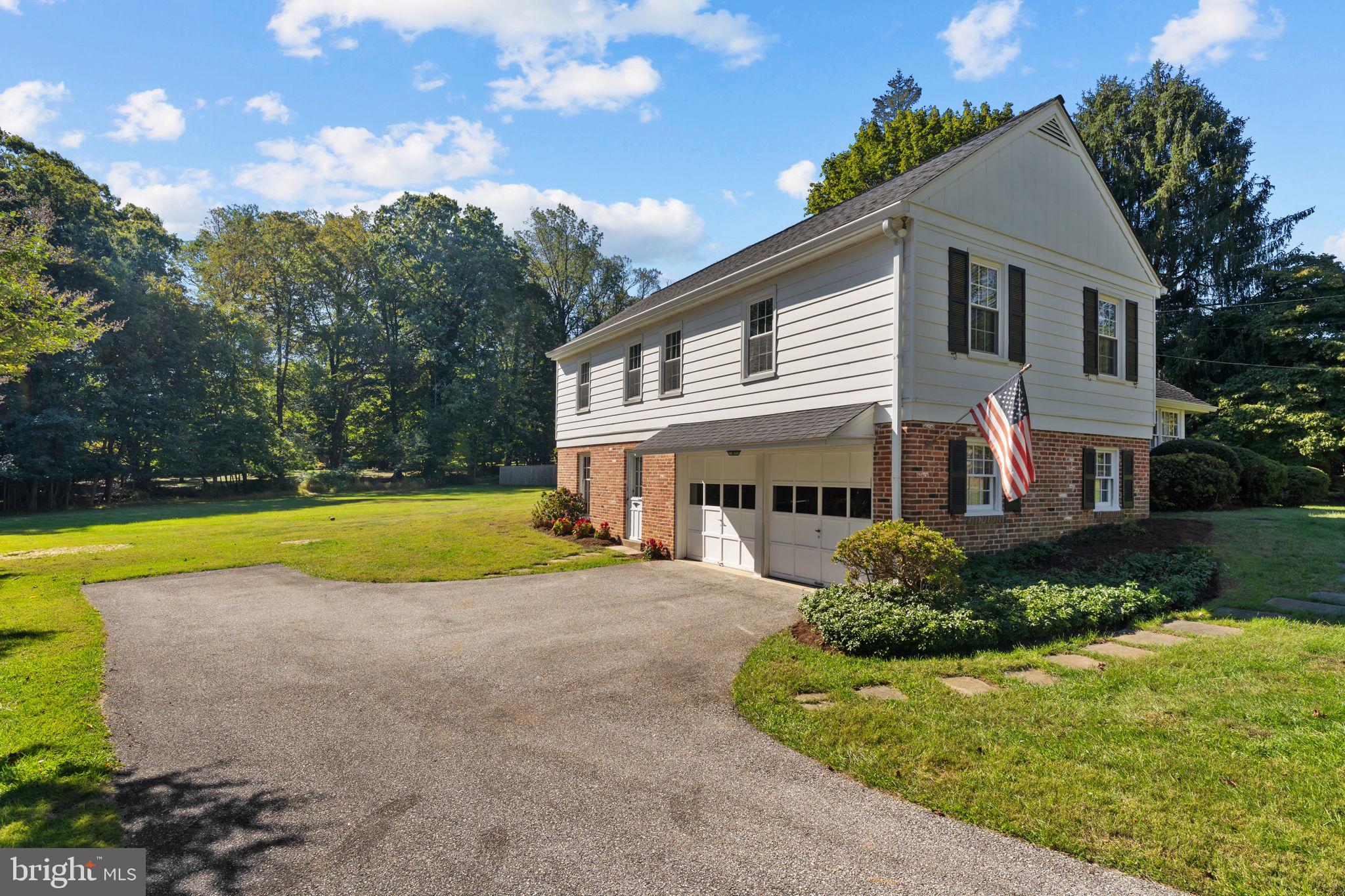962 Weadley Road Radnor, PA 19087 - Photo 38 of 45 a view of house with swimming pool and yard