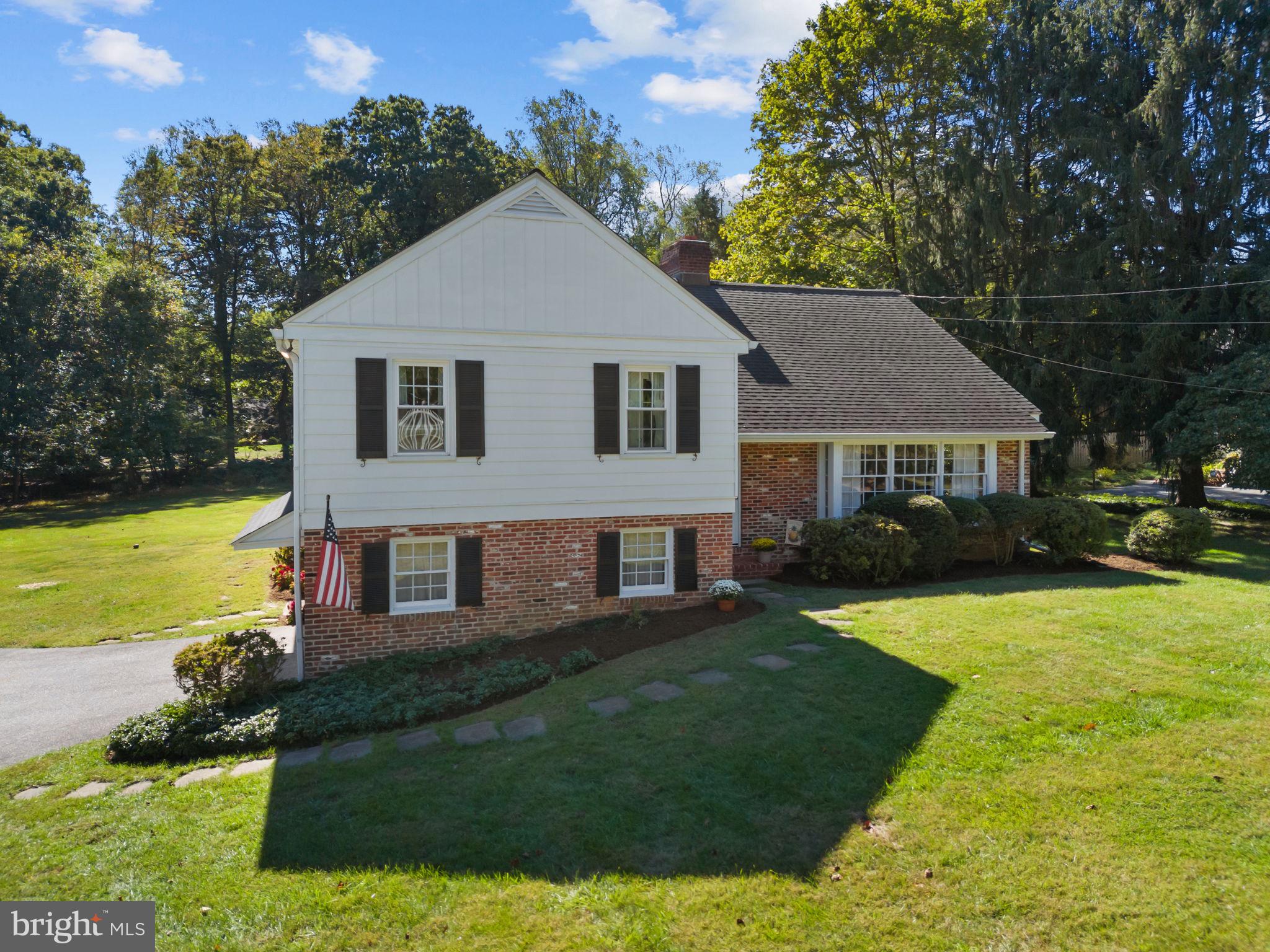 962 Weadley Road Radnor, PA 19087 - Photo 39 of 45 a front view of a house with a yard