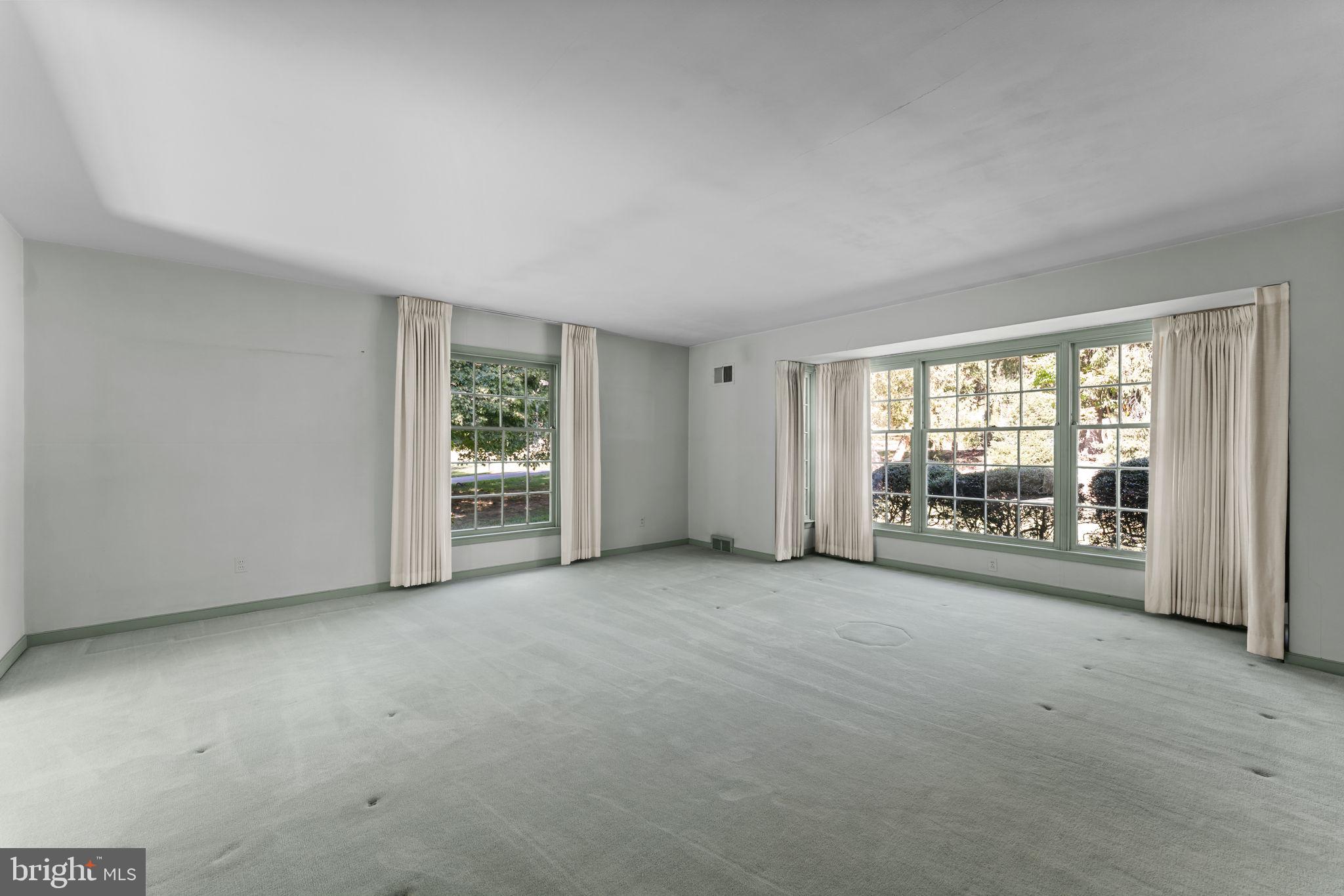 962 Weadley Road Radnor, PA 19087 - Photo 5 of 45 an empty room with windows