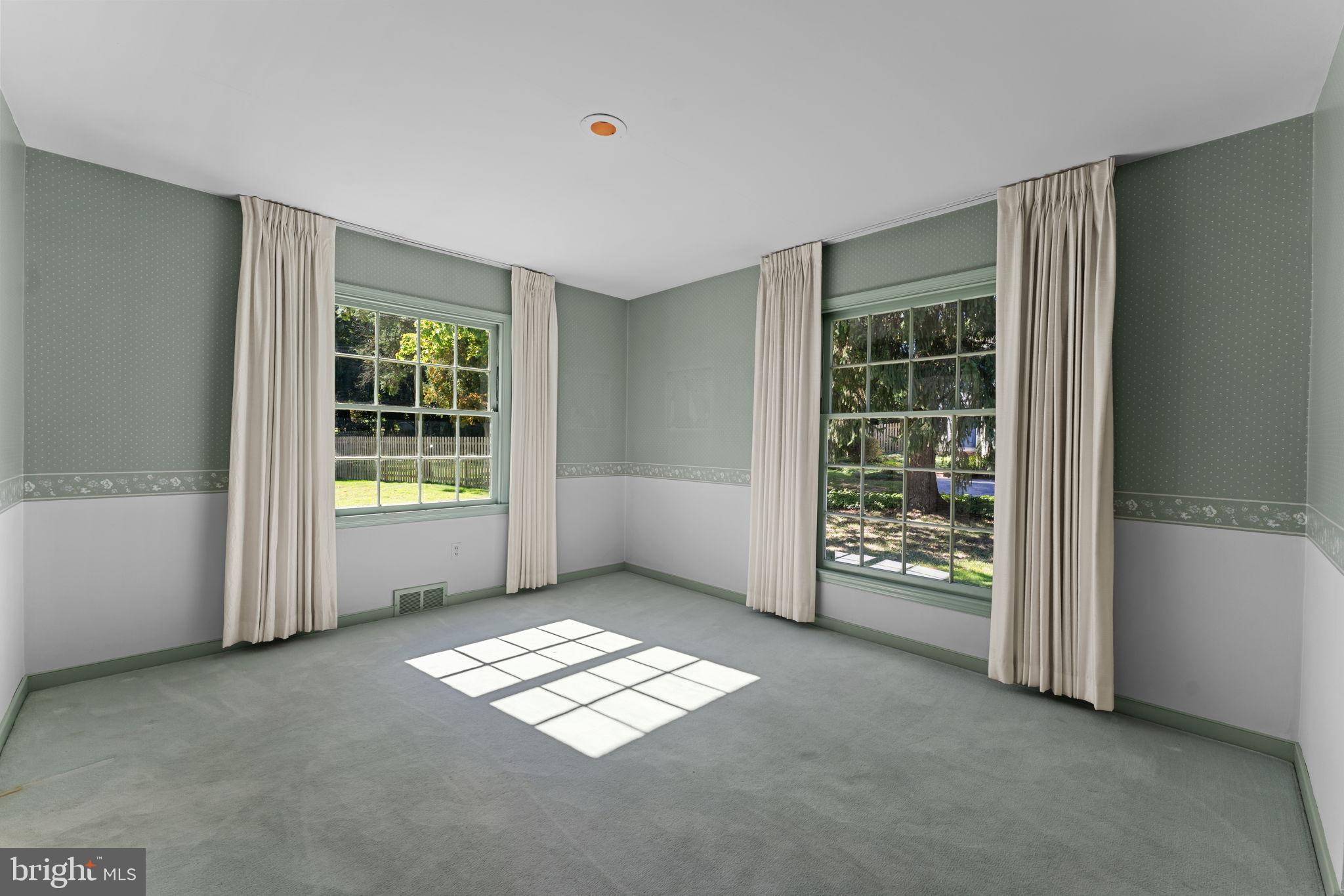 962 Weadley Road Radnor, PA 19087 - Photo 8 of 45 a view of empty room with windows