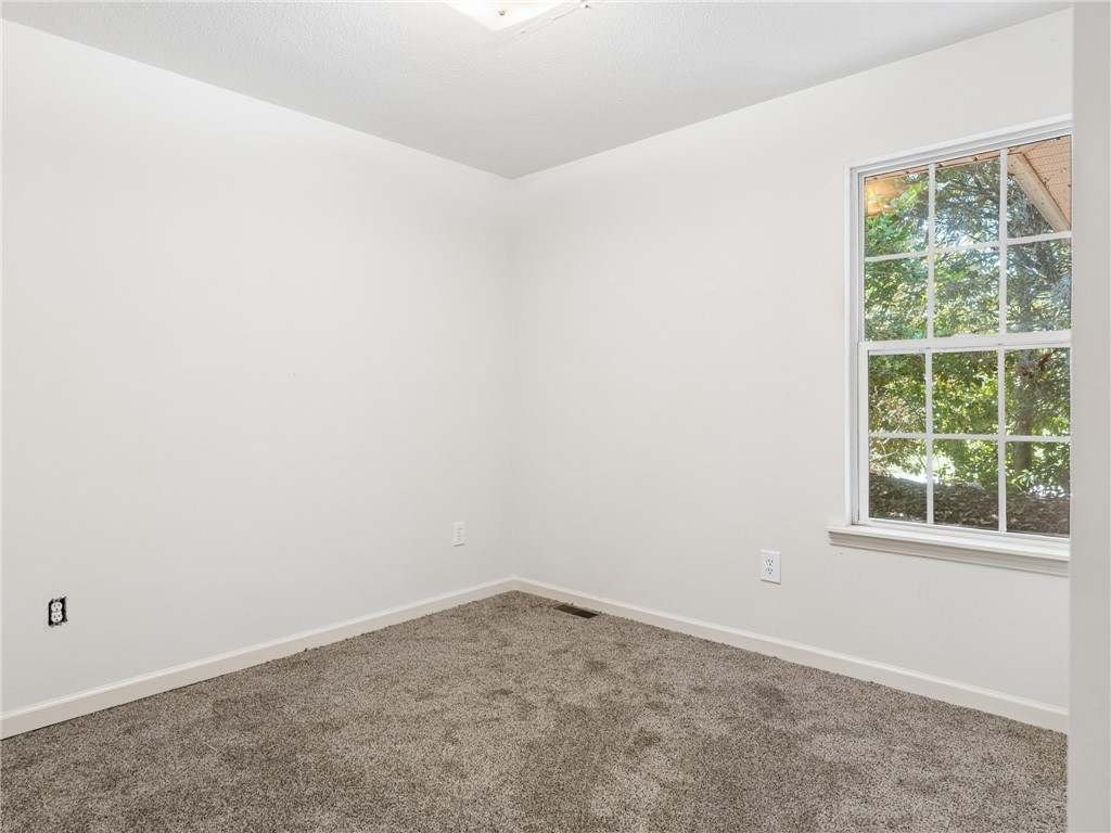101 Woodbridge Circle Anderson, SC 29621 - Photo 14 of 21 This airy room offers a tranquil escape, perfect for quiet moments or productive work.
