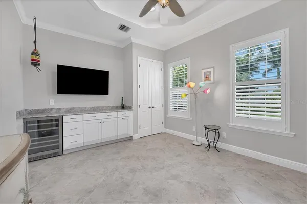 a room with furniture and flat screen tv