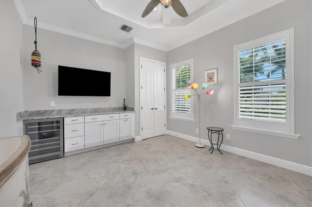 a room with furniture and flat screen tv