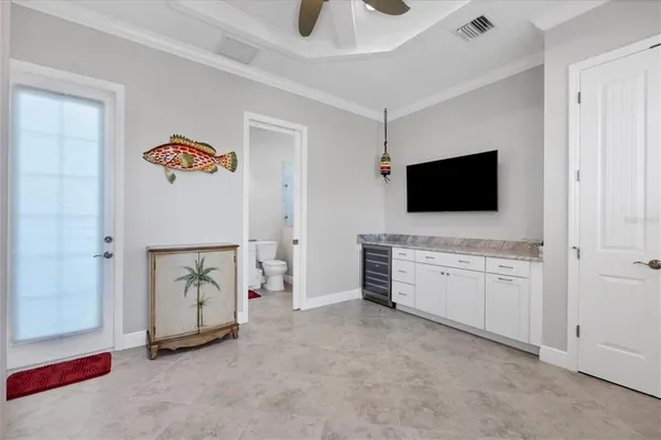 a room with furniture and flat screen tv