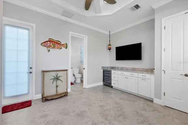 a room with furniture and flat screen tv