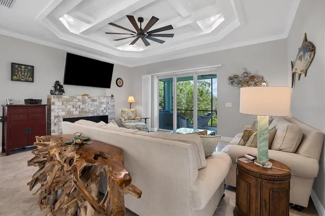 a living room with furniture fireplace and a flat screen tv