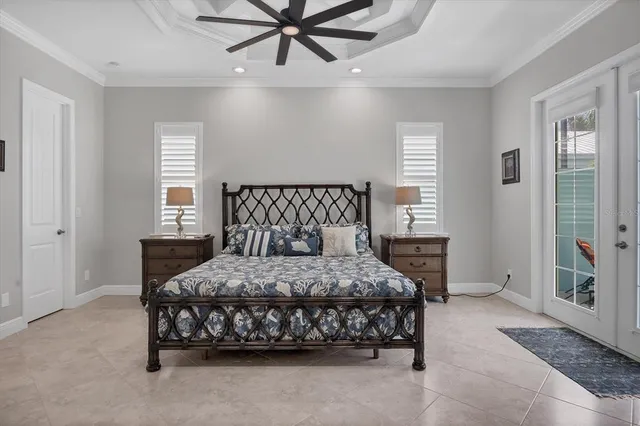 a bedroom with a bed and window