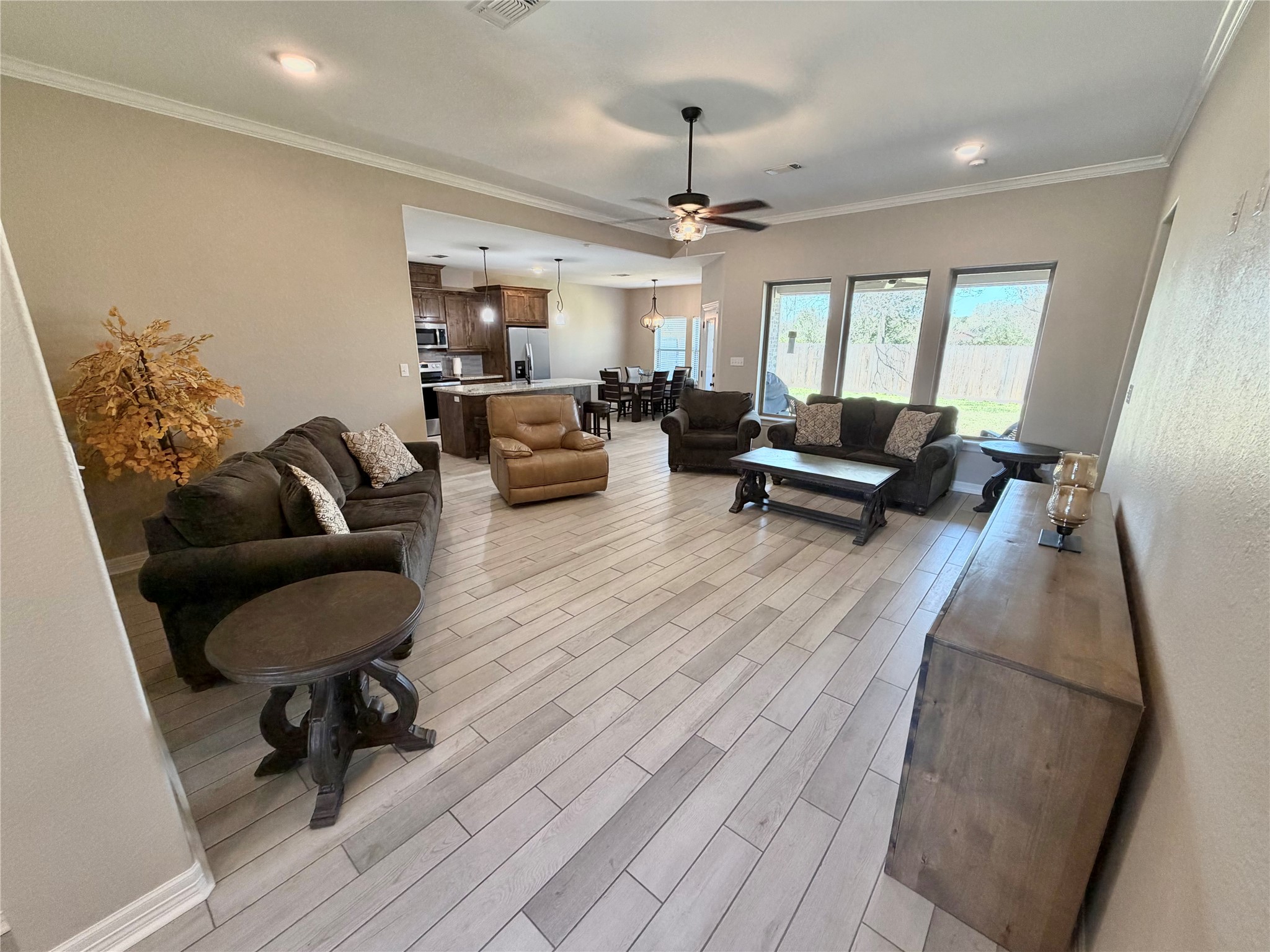 216 Shannon Street Angleton, TX 77515 - Photo 13 of 26 a living room with furniture and a rug