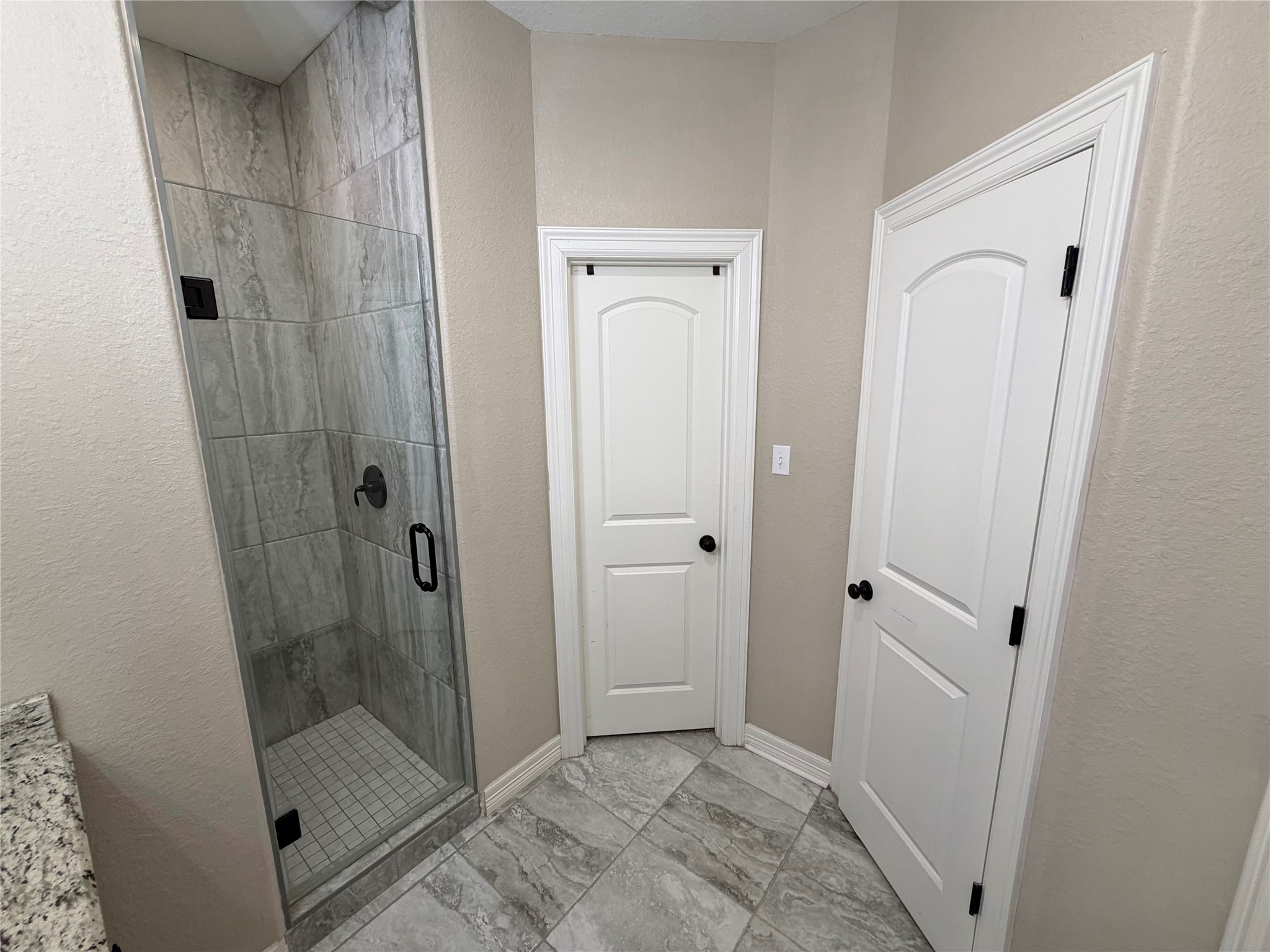216 Shannon Street Angleton, TX 77515 - Photo 23 of 26 a bathroom with a shower and toilet