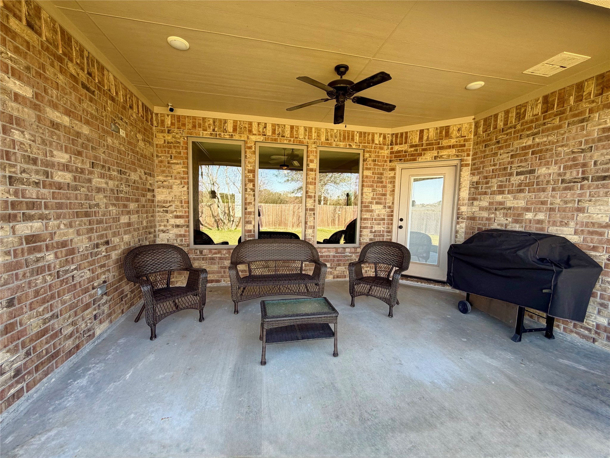 216 Shannon Street Angleton, TX 77515 - Photo 24 of 26 a living room with furniture and a large window