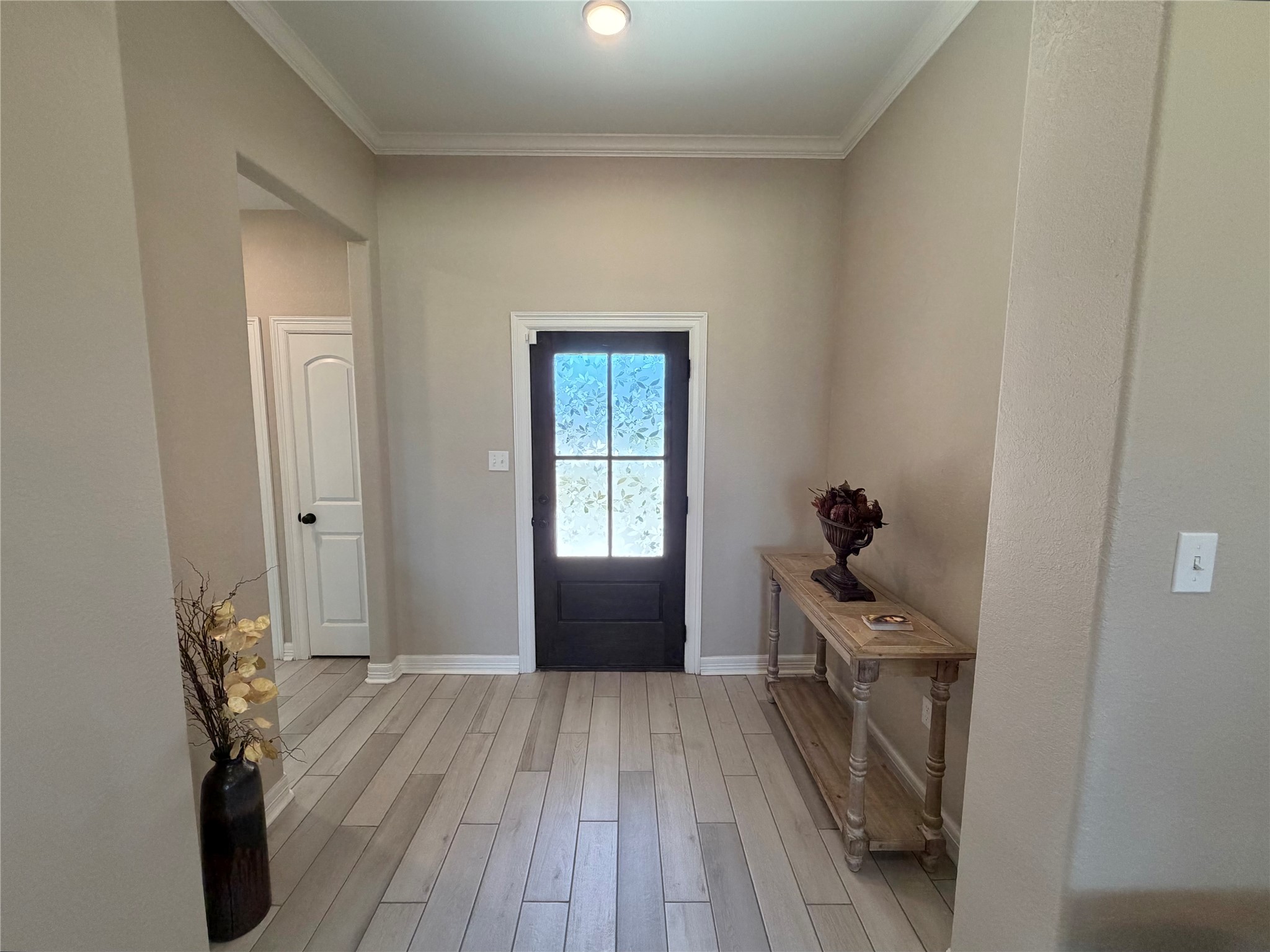 216 Shannon Street Angleton, TX 77515 - Photo 3 of 26 a view of entryway with wooden floor