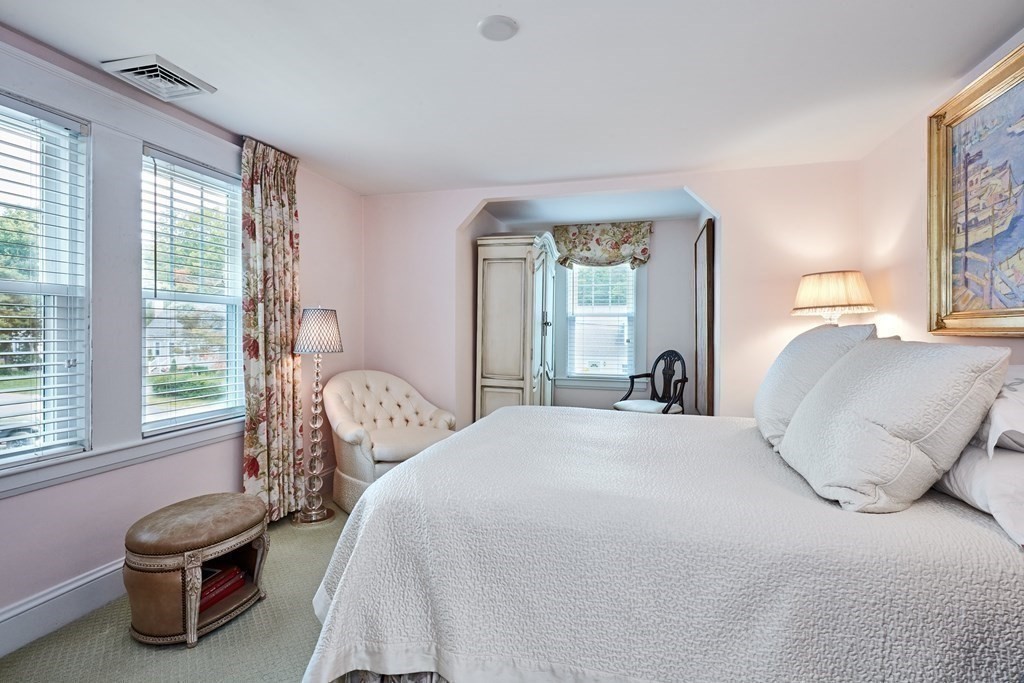 42 Buckmaster Road Westwood, MA 02090 - Photo 14 of 27 a bedroom with a bed and a window