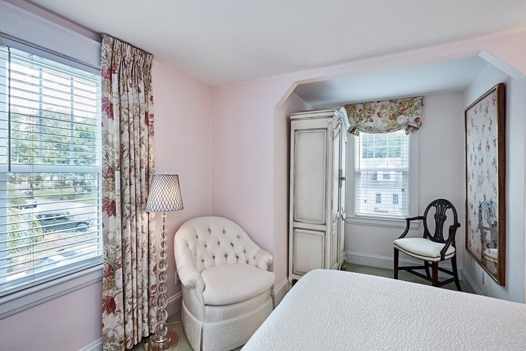 42 Buckmaster Road Westwood, MA 02090 - Photo 15 of 27 a living room with furniture and a large window